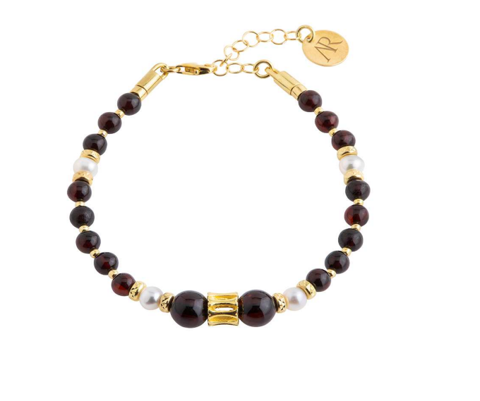 A gold plated 925 silver bracelet with pearls and dark cherry amber