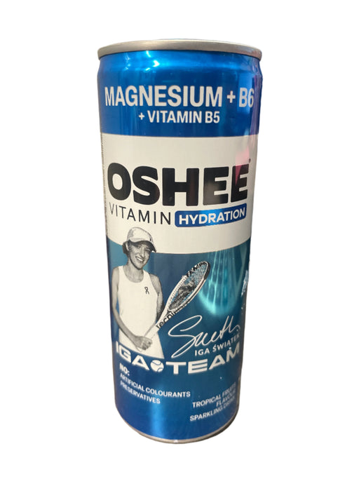 Oshee sports drink can on a wooden surface
