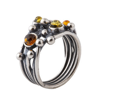 Oxidized silver ring with a Baltic amber elements