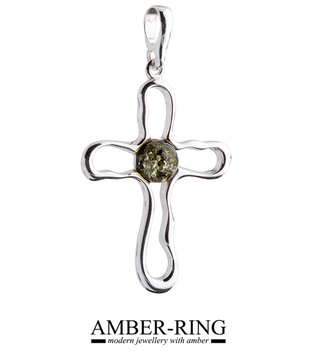 Silver and amber cross in green color