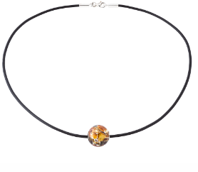 A necklace with pressed amber ball