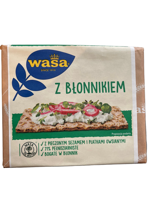Wasa bread packaging with a flatbread and toppings on a metallic surface
