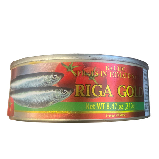 Can of Riga Gold fish on a wooden surface
