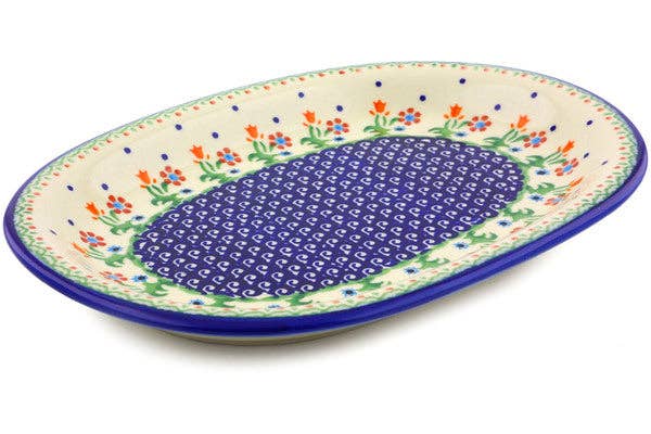 Decorative ceramic plate with floral patterns on a white background