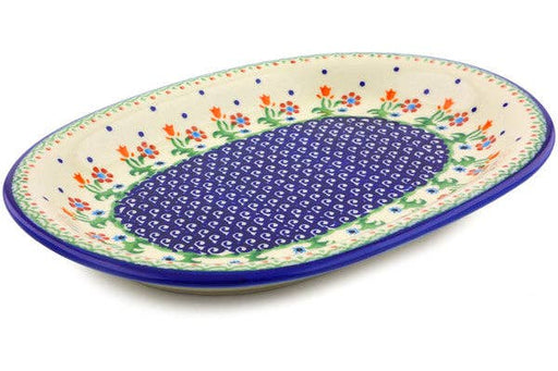 Decorative ceramic plate with floral patterns on a white background