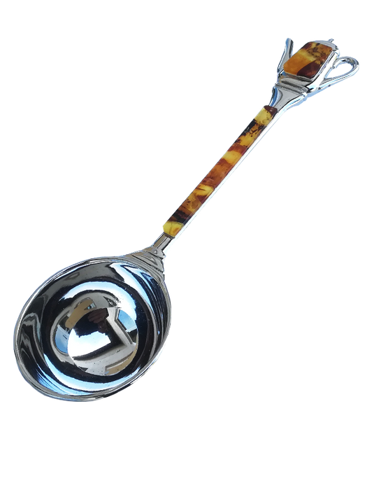 Scoop for coffee decorated with amber