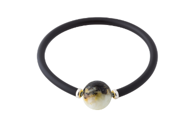 A bracelet with a built-in spring with a ball of Baltic amber