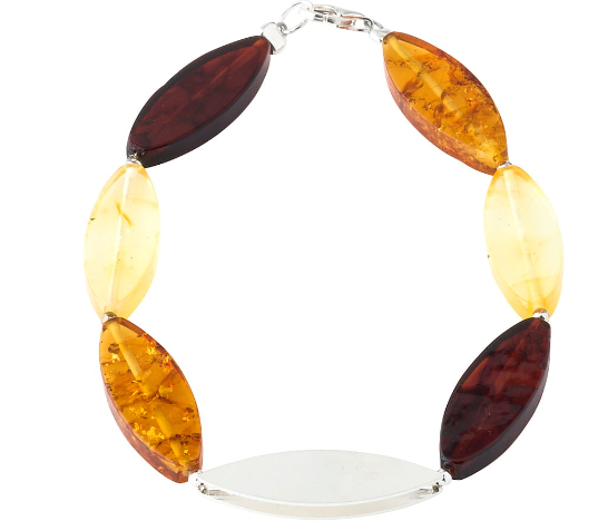 A bracelet made of amber in three colors and silver in the shape of leaves.