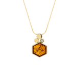 Beautiful necklace, an elegant cognac amber pendant on a long chain with a shiny zircon