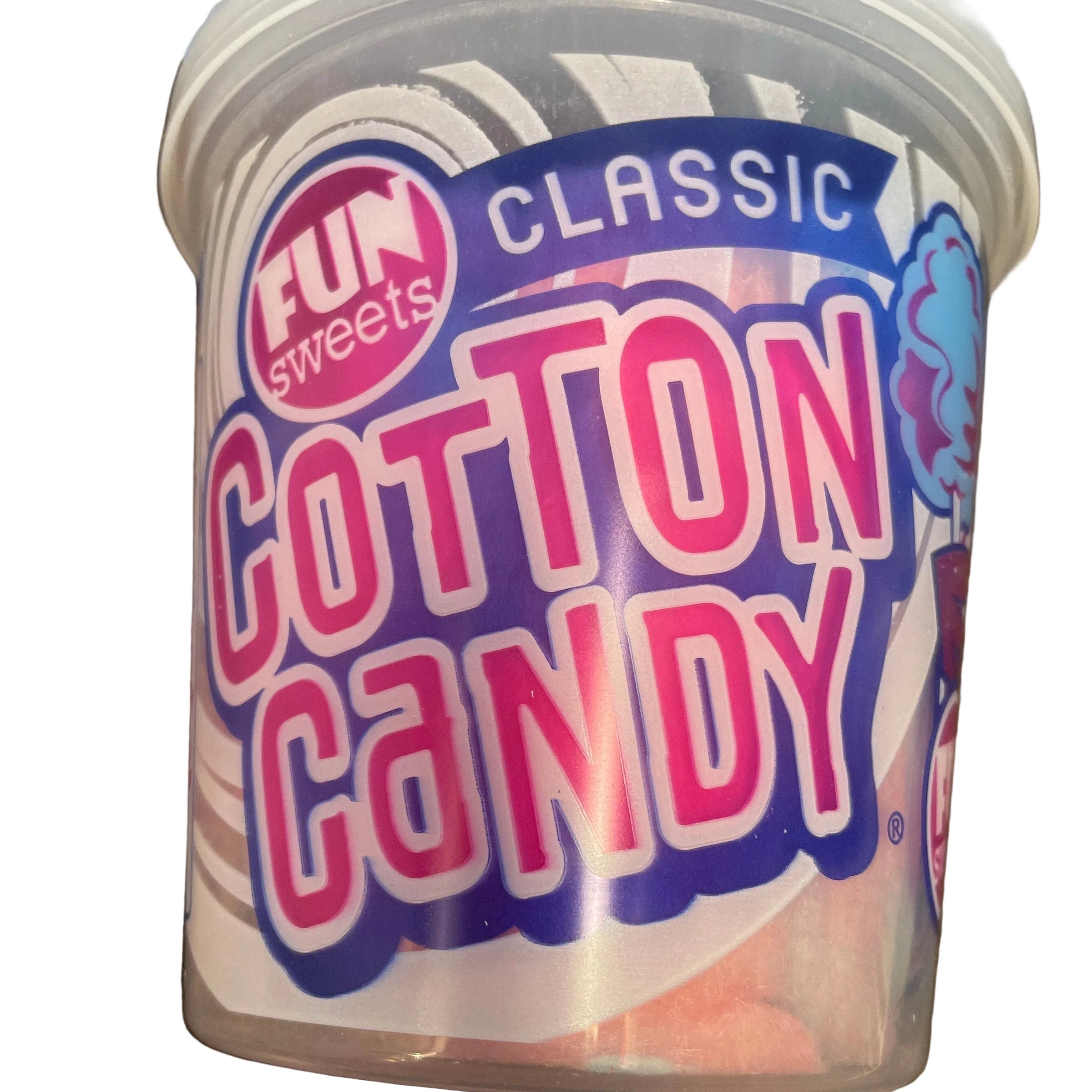 Container of cotton candy with colorful label on a wooden surface