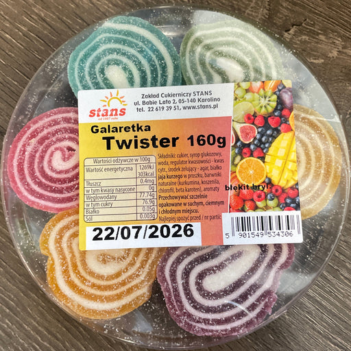 Packaged candy with a label on a wooden surface