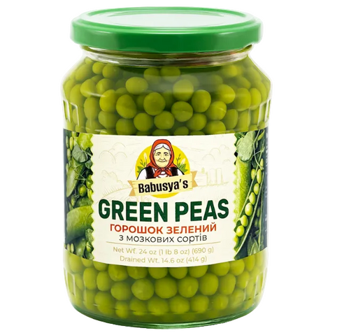 Jar of green peas with a label on a white background