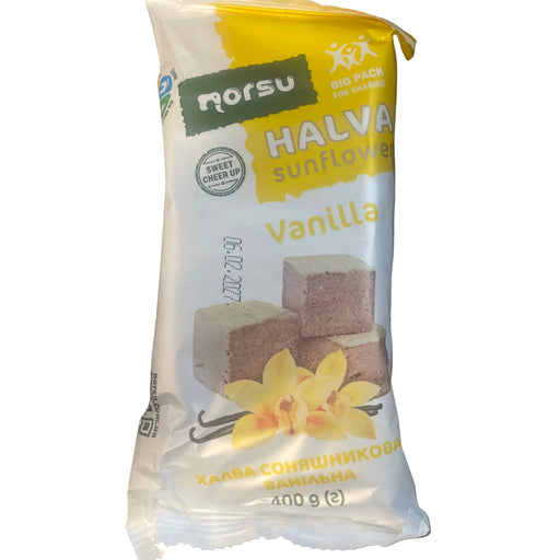 Packaged halva on a wooden surface
