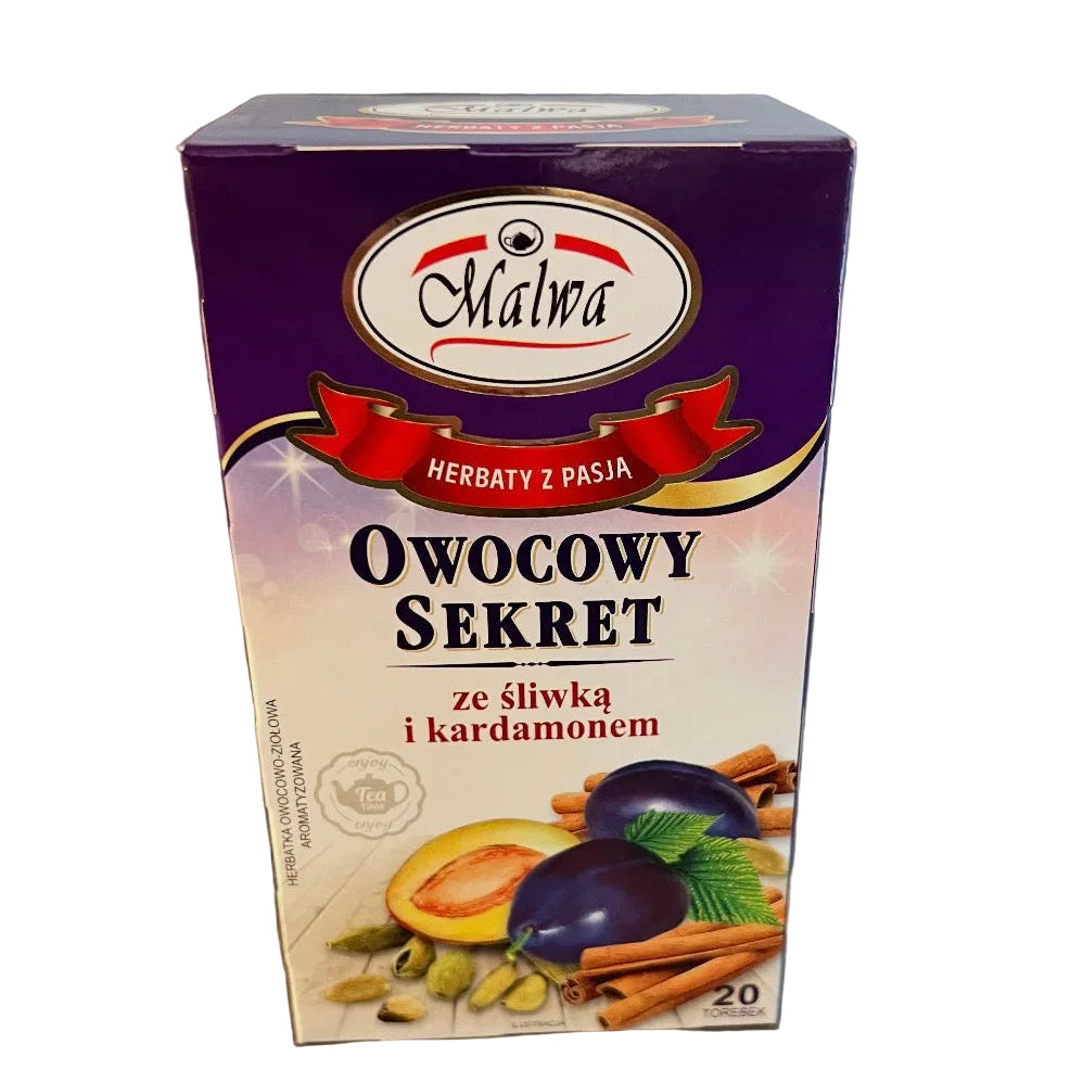 Box of Malva fruit secret tea with plums, cardamom, and cinnamon on a metallic surface.