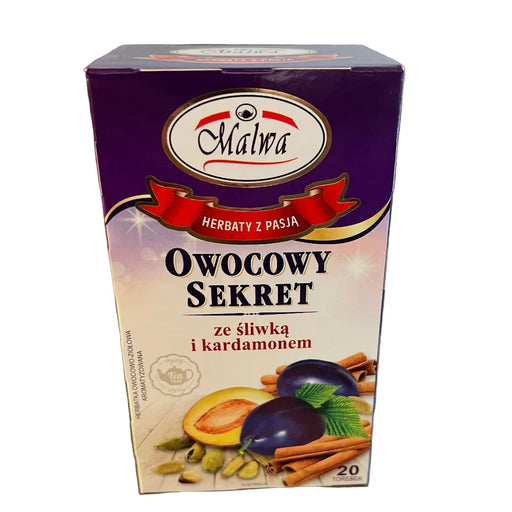 Box of Malva fruit secret tea with plums, cardamom, and cinnamon on a metallic surface.
