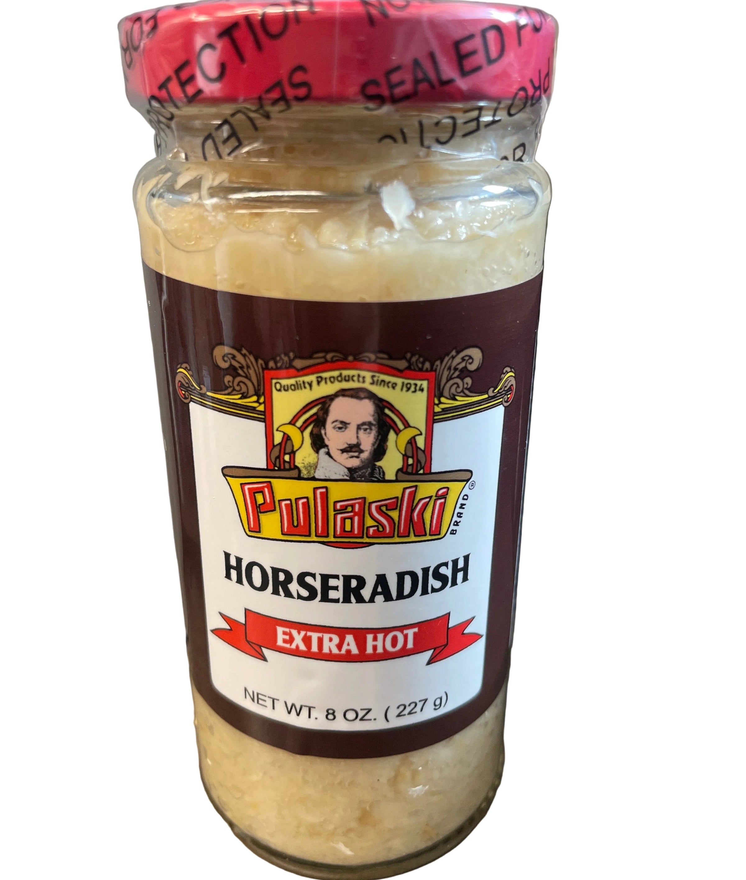Jar of Polaski's Extra Hot Horseradish on a wooden surface