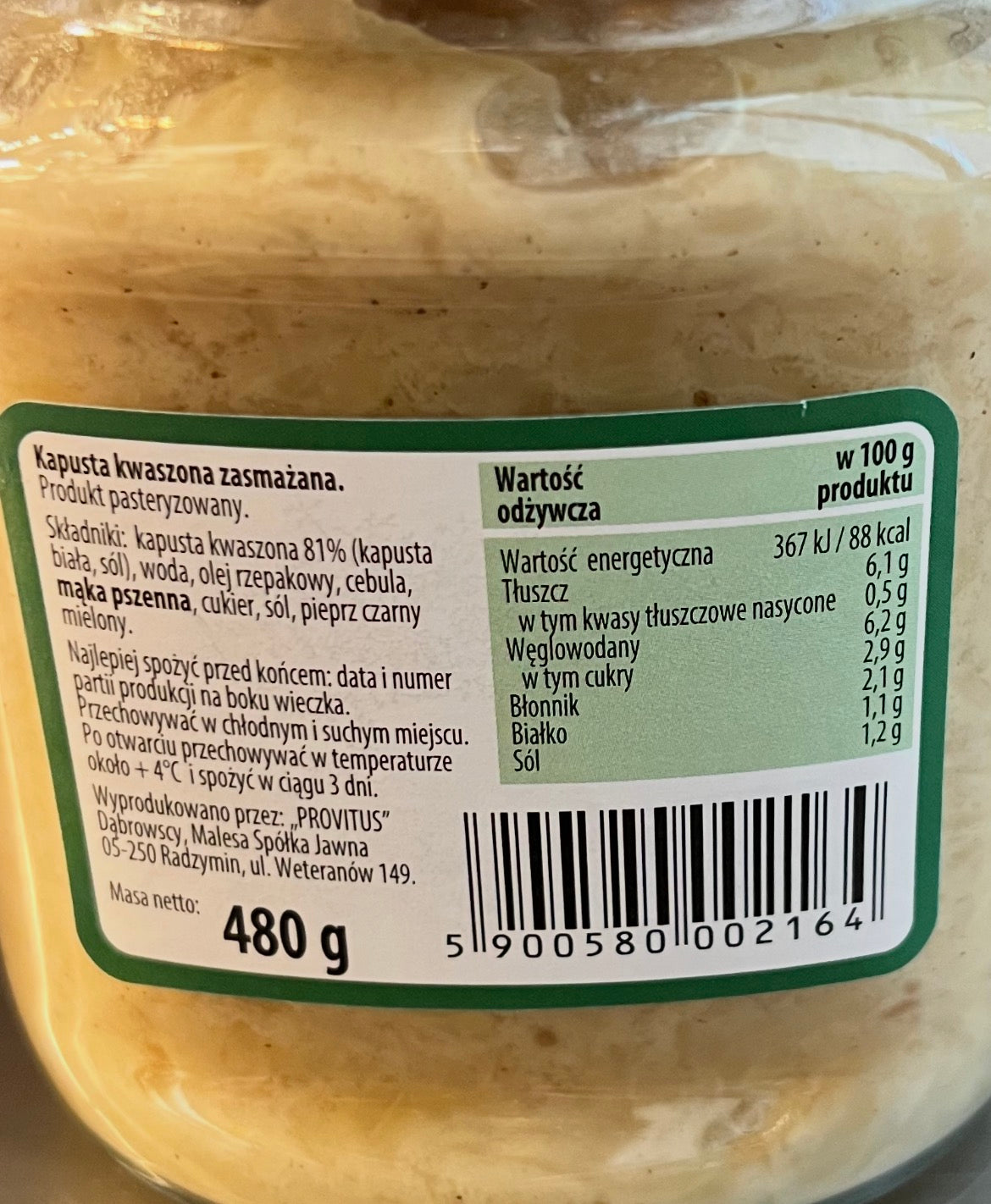 Jar of pickled cabbage with a label showing nutritional information and product details.