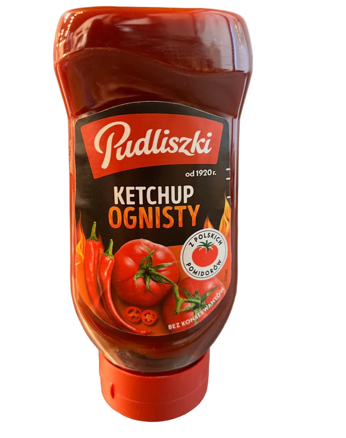 Bottle of Pudliszki Ketchup Ognisty on a metallic surface