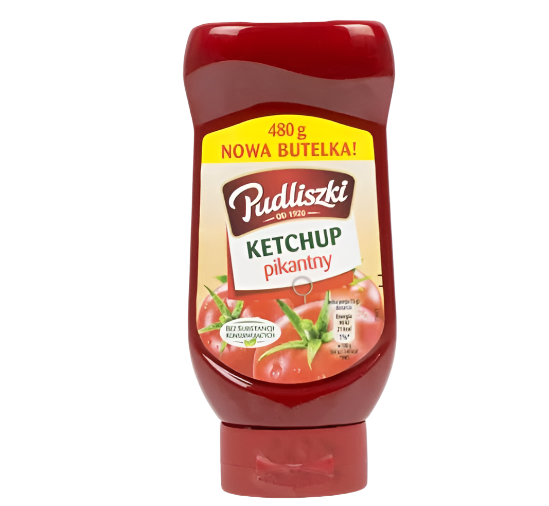 A bottle of Pudliski ketchup, with a red label and a clear red bottle, containing 480g of the product.