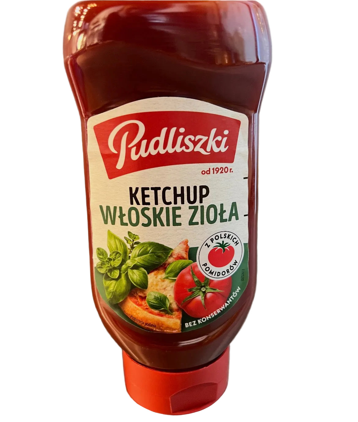 Pudliszki ketchup bottle with label on a metallic surface