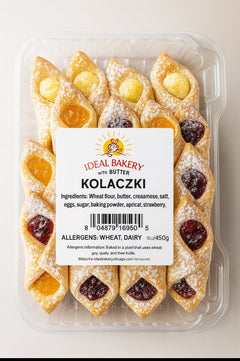 Packaged Kolaczki with Ideal Bakery label on a neutral background