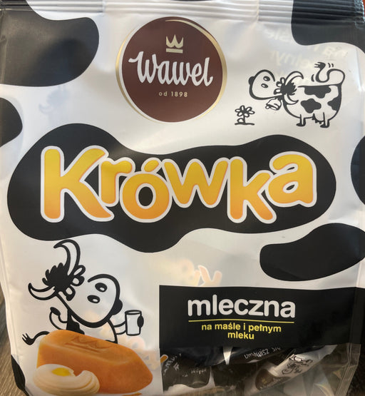 Packaged product with 'Krowka' branding on a wooden surface