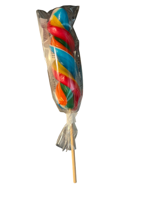 Colorful striped lollipop in clear plastic packaging on a metallic surface