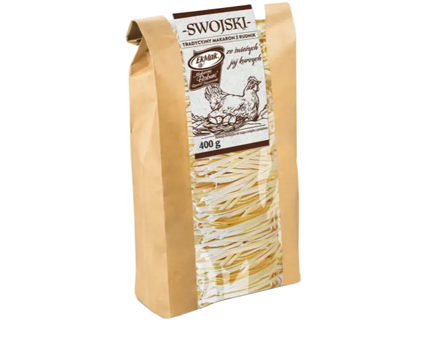 A package of Makaron Swojski Wstazka pasta, with a weight indication of 400g, featuring a beige-colored packaging with text and branding.
