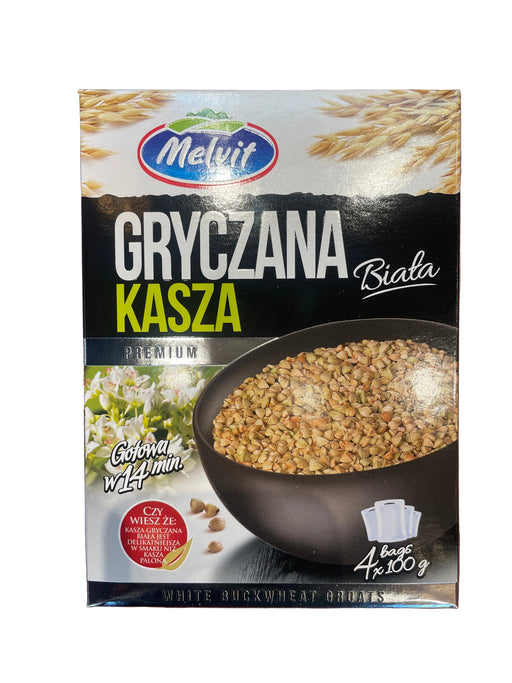 Packaging of Melvit white buckwheat cereal on a wooden surface
