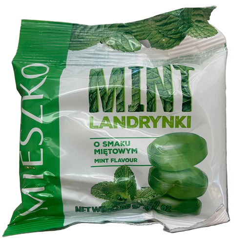 Green and white package of Mieszko snacks on a gray surface