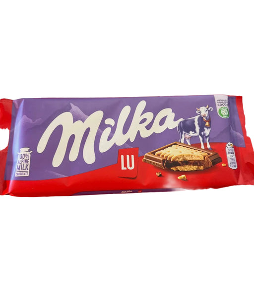 Milka chocolate bar packaging on a red background