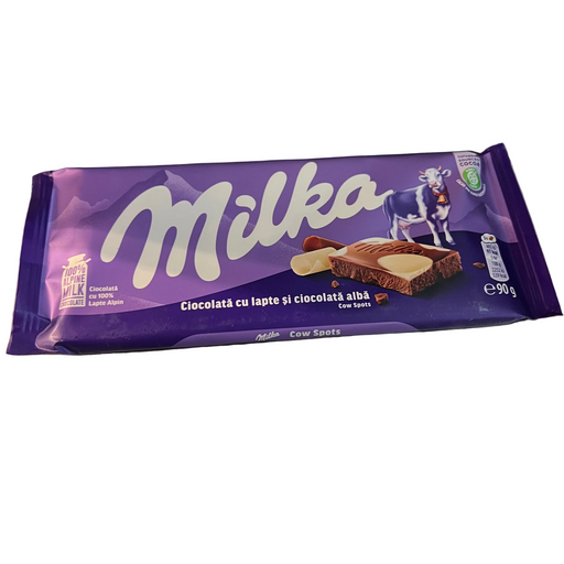 Milka chocolate bar packaging on a metallic surface