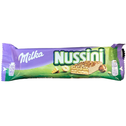 Nussini Milka chocolate bar on a wooden surface