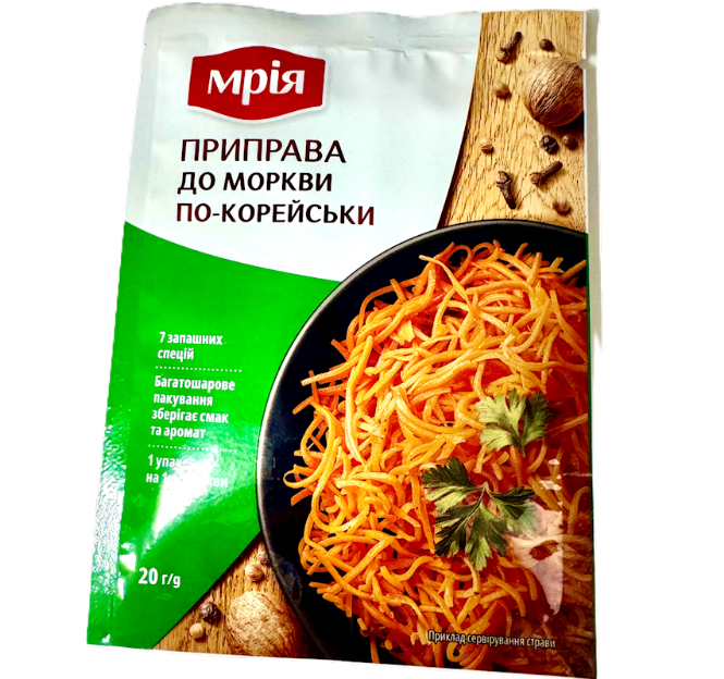 Packaging of a seasoning mix for Korean-style carrots with a brand logo on a white background.