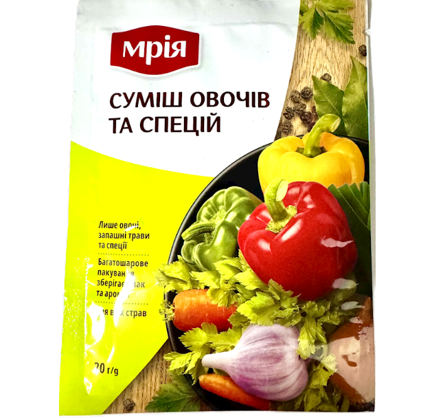 Packaging of vegetable mix and spices with colorful peppers and vegetables on a white background