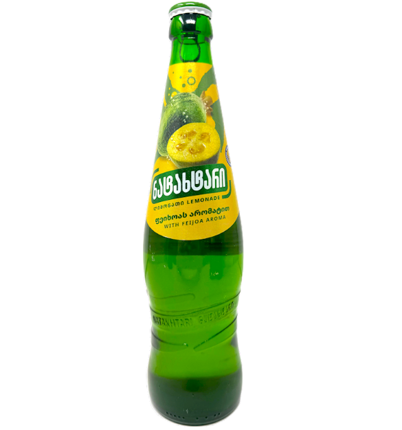 Green glass bottle with a yellow label on a white background