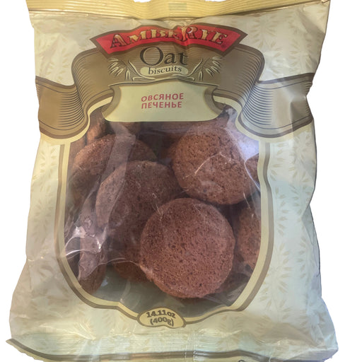 Packaged oat cookies with visible brand logo on a wooden surface