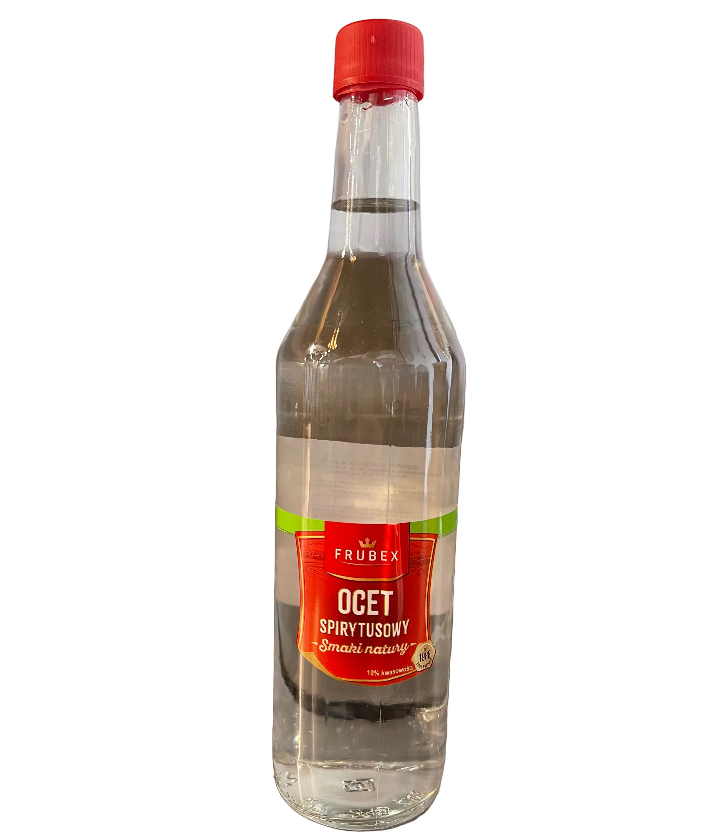 Clear bottle with a red cap and label on a metallic surface