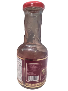 Organic pomegranate juice poured into glass fresh and natural