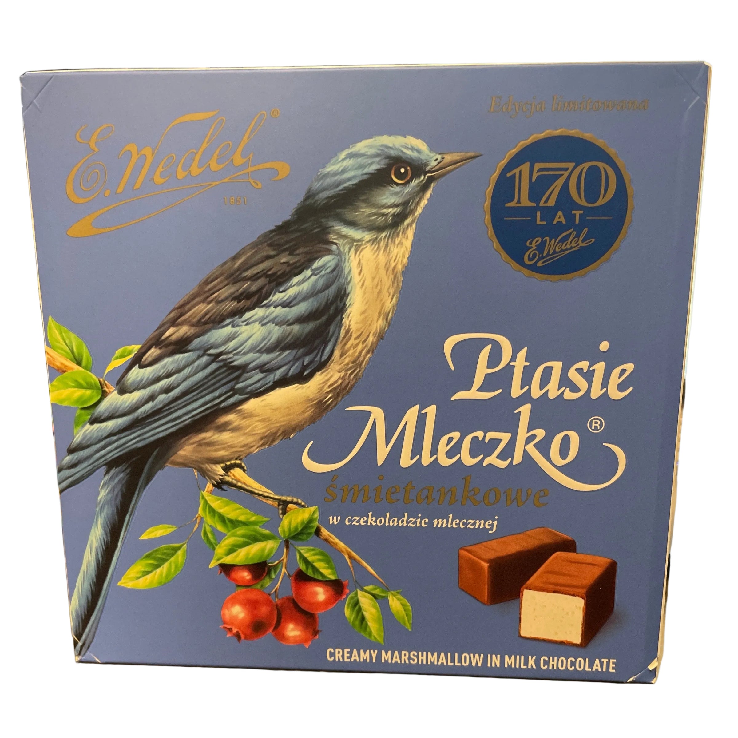 Box of Plasie Meczko chocolate with a bird illustration on a wooden surface.