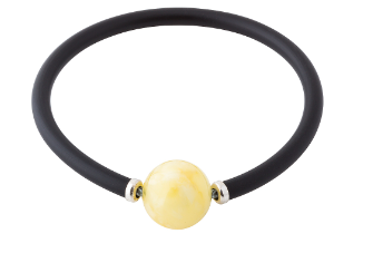 An impressive bracelet with a built-in spring with a ball of milky Baltic amber