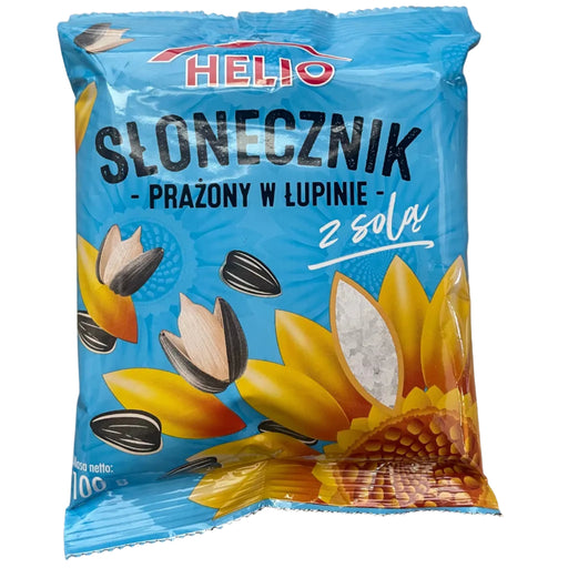 Blue package of sunflower seeds with a sunflower design on a gray background