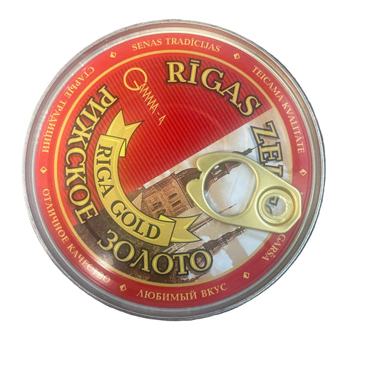 Round container with 'Rigas' branding on a metallic surface
