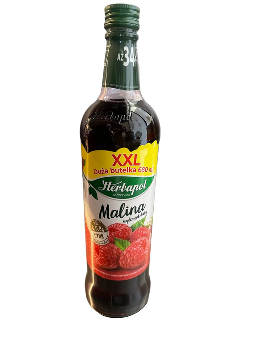 Bottle of Hertanol Malina syrup on a metallic surface