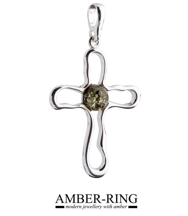 Silver and amber cross in green color