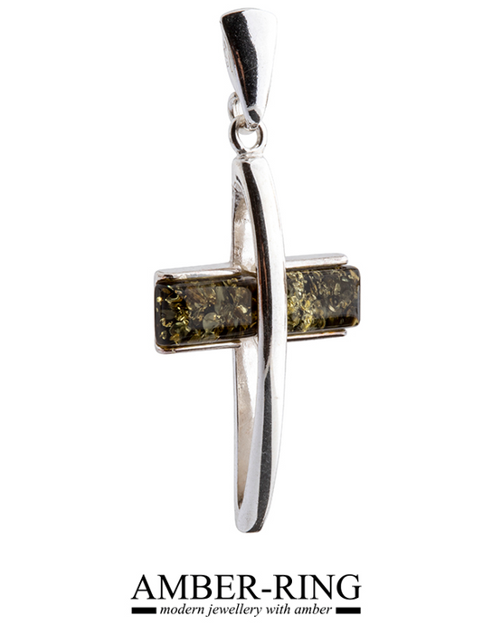 delicate silver and amber cross in green color