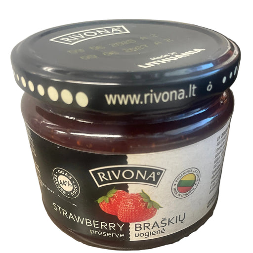 Jar of Rivona strawberry preserve on a wooden surface