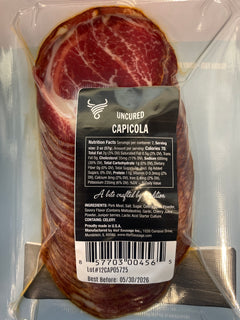 Packaged capicola with a label on a clear background