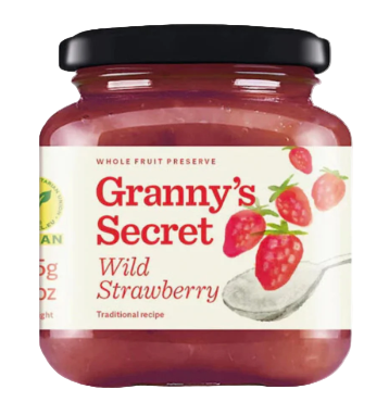 Jar of Granny's Secret Wild Strawberry preserve on a white background