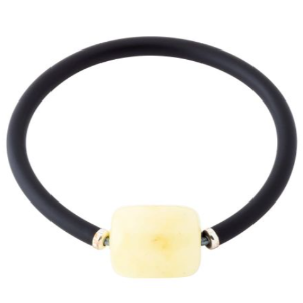 An impressive casual bracelet with a built-in spring and a roller of milky amber, adjustable